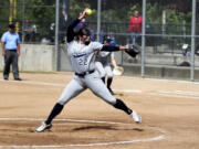 Skyview junior Maddie Milhorn delivers a pitch in a first-round game against Puyallup at the District 3/4 softball tournament on Friday, May 17, 2024 in Kent.