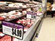 A person shops in the meats section of a grocery store on Sept. 12, 2023, in Los Angeles, California. The Consumer Price Index (CPI) will be released tomorrow showing the latest inflation data and providing perspective on possible future interest rate moves by the Federal Reserve.