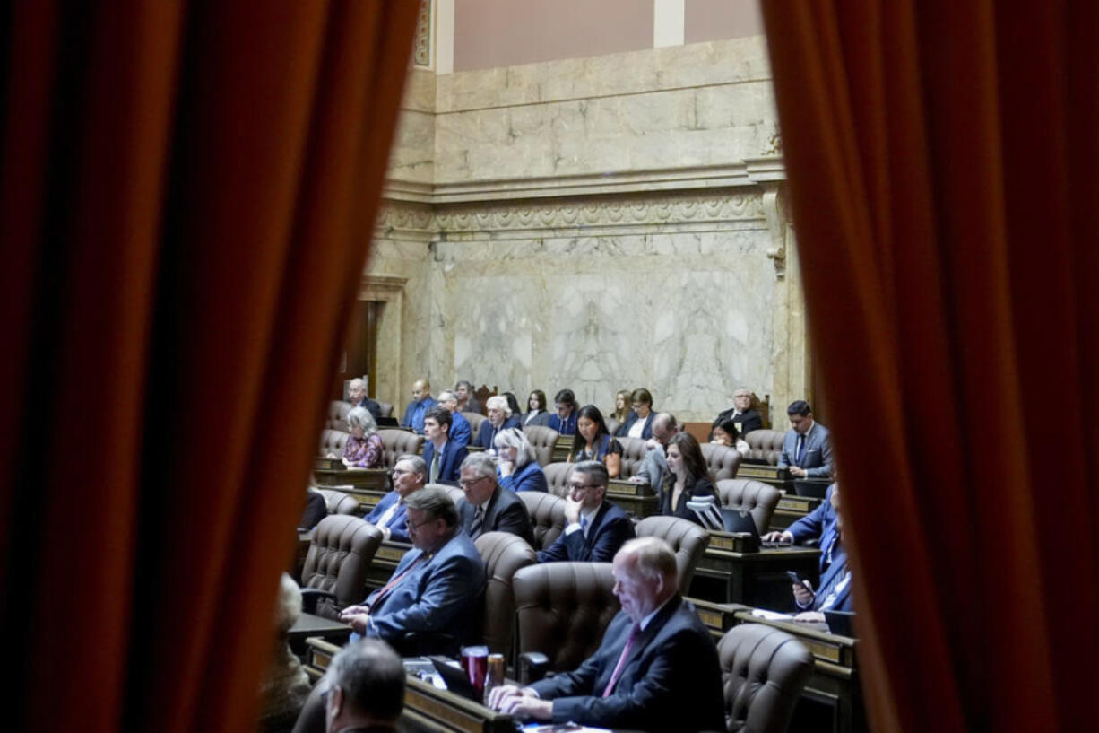 Members of the House convene on the first day of the legislative session at the Washington state Capitol, Monday, Jan. 8, 2024, in Olympia.