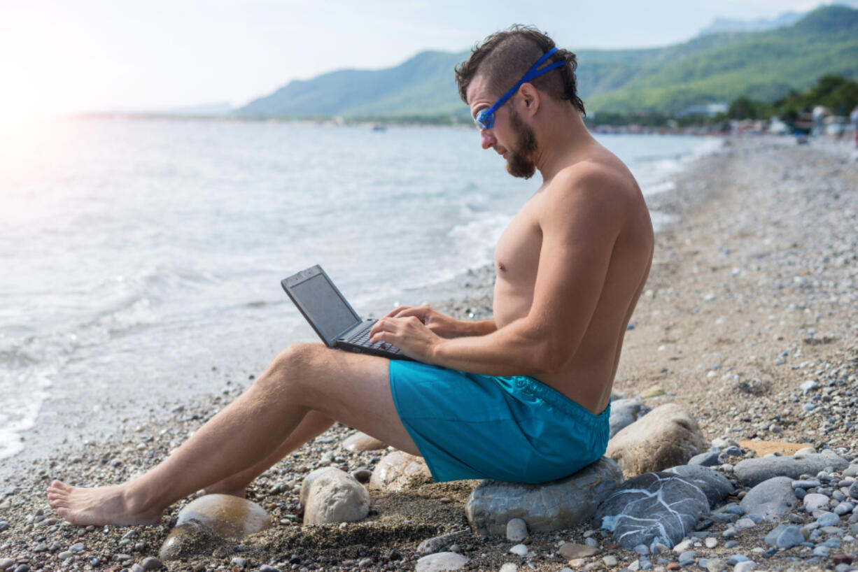 While this man is taking working while traveling nearly to an extreme, other set-ups can work well when you bring your job on your vacation.