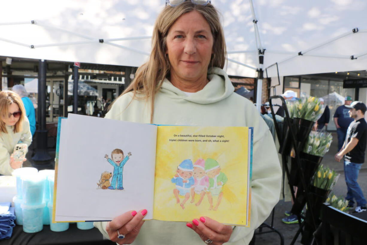 On Saturday, April 20, the Ethan&Ccedil;&fnof;&Ugrave;s Smile Foundation opened its inaugural booth at the Tulip Festival Street Fair. This book illustration is based on a real image of triplets Ethan, Maizie and Hunter Chapin.