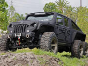 The seven-seat Apocalypse HellFire, a converted six-wheel-drive Jeep, is shown at Apocalypse Manufacturing in Pompano Beach, Florida, on May 16, 2024.