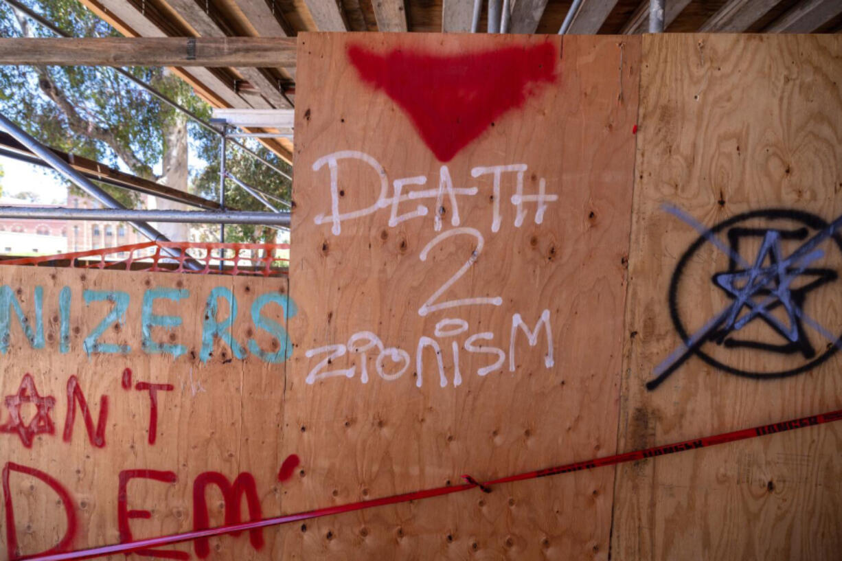Graffiti at the Powell Library on the UCLA campus, where pro-Palestinian demonstrators erected an encampment in Dickson Plaza on April 29, 2024, in Los Angeles.