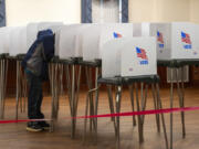 A voter casts his ballot in the 2024 Maryland Primary election in Chester,  Maryland, on May 14, 2024.