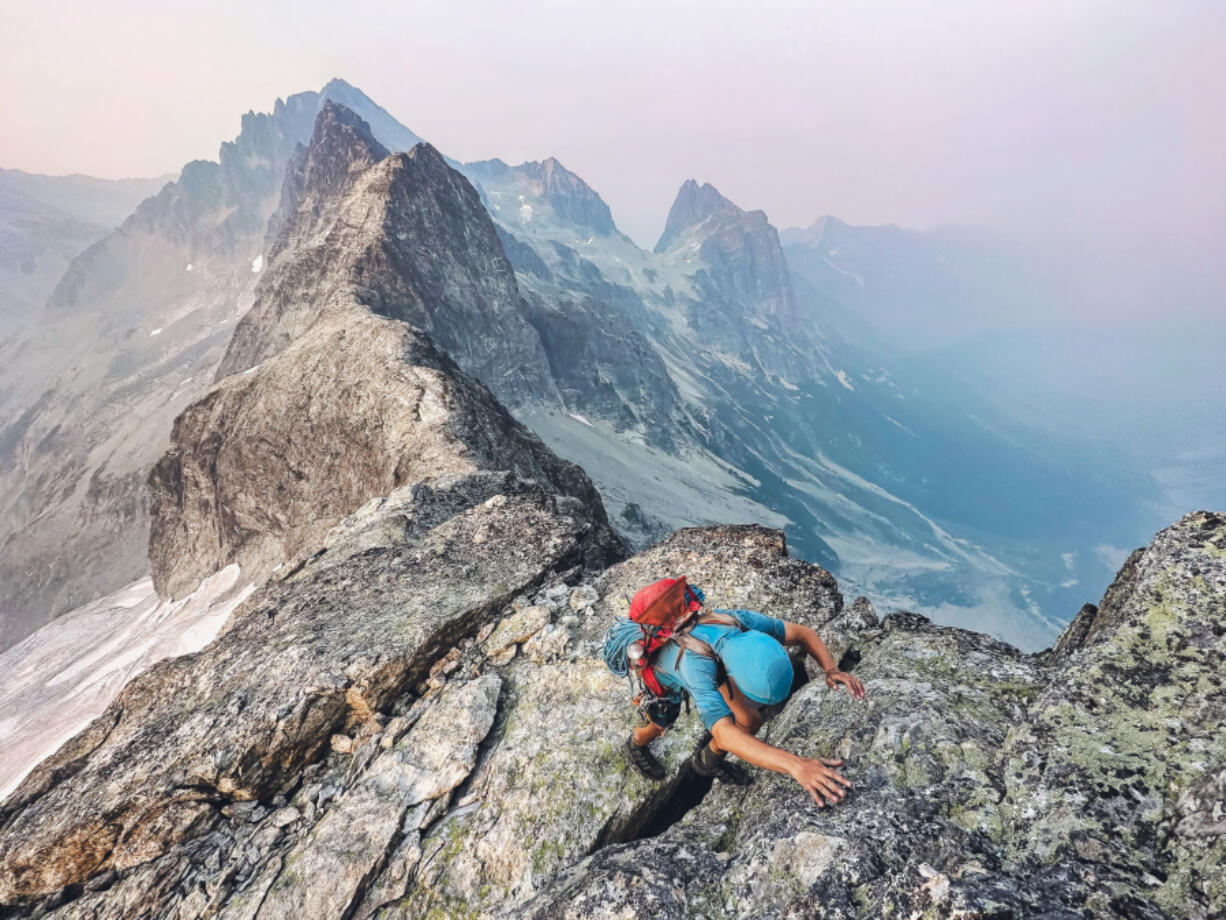 Andrew Okerlund, 20, a 2021 Camas High School graduate, climbs the northeast ridge of Easy Mox in Washington during the summer of 2023.