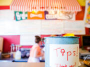 Service charges are separate from tips, sometimes causing confusion once the check arrives.