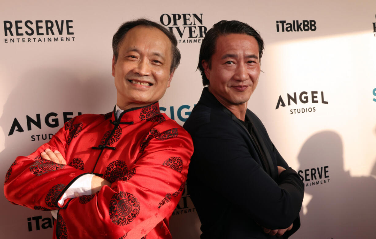 Dr. Ming Wang, left, and actor Terry Chen attend the Los Angeles premiere of &ldquo;Sight&rdquo; at AMC Century City 15 on May 14 in Century City, Calif.