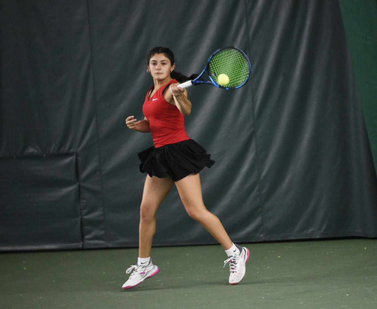 Hailey Kerker of Camas hits a return during the girls singles third-place match at the 4A state tennis tournament at The Pacific Clinic in Kennewick on Saturday, May 25, 2024. For the third year in a row Kerker is The Columbian&#039;s All-Region girls tennis player of the year.