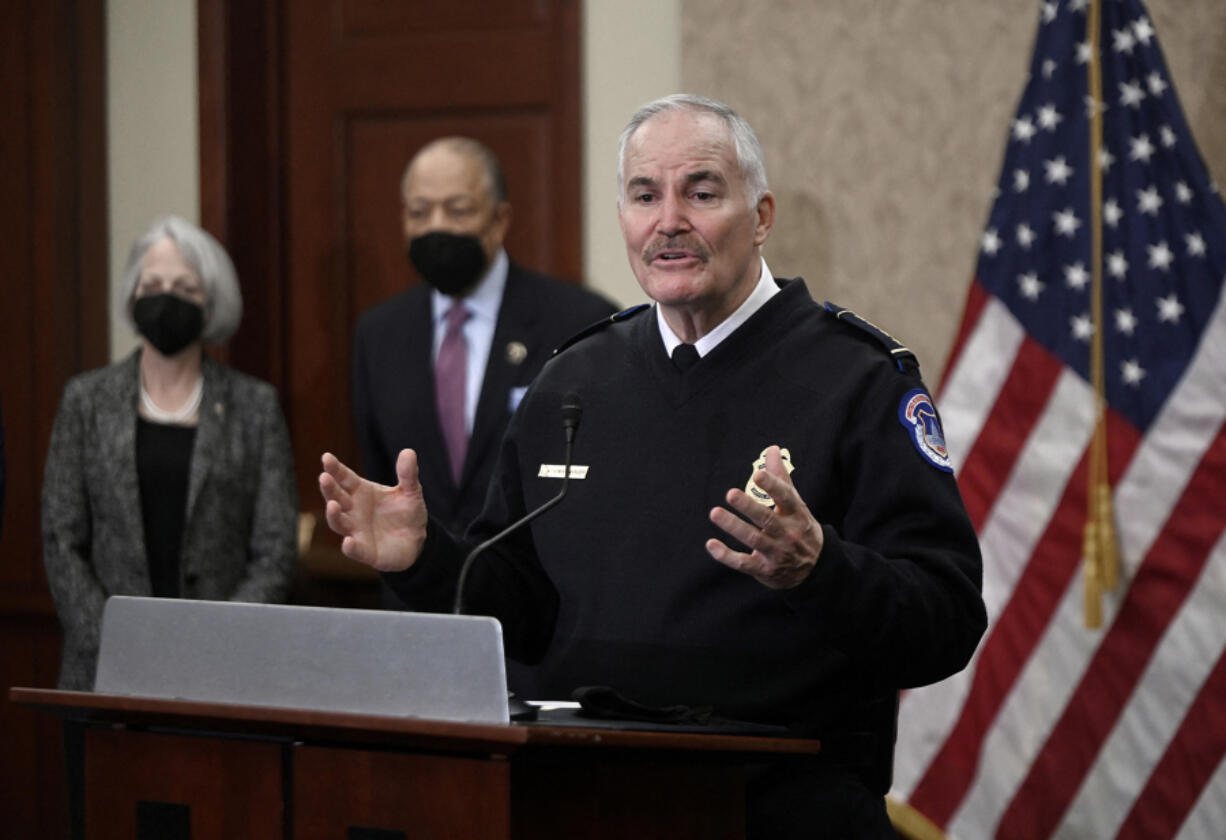 US Capitol Police Chief J. Thomas Manger (right) speaks about security improvements around Capitol Hill as Senate Sergeant-at-Arms Karen Gibson, and House Sergeant-at-Arms William Walker listen during a news conference in the Capitol Visitor Center on Jan. 4, 2022, in Washington, D.C.