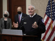 US Capitol Police Chief J. Thomas Manger (right) speaks about security improvements around Capitol Hill as Senate Sergeant-at-Arms Karen Gibson, and House Sergeant-at-Arms William Walker listen during a news conference in the Capitol Visitor Center on Jan. 4, 2022, in Washington, D.C.