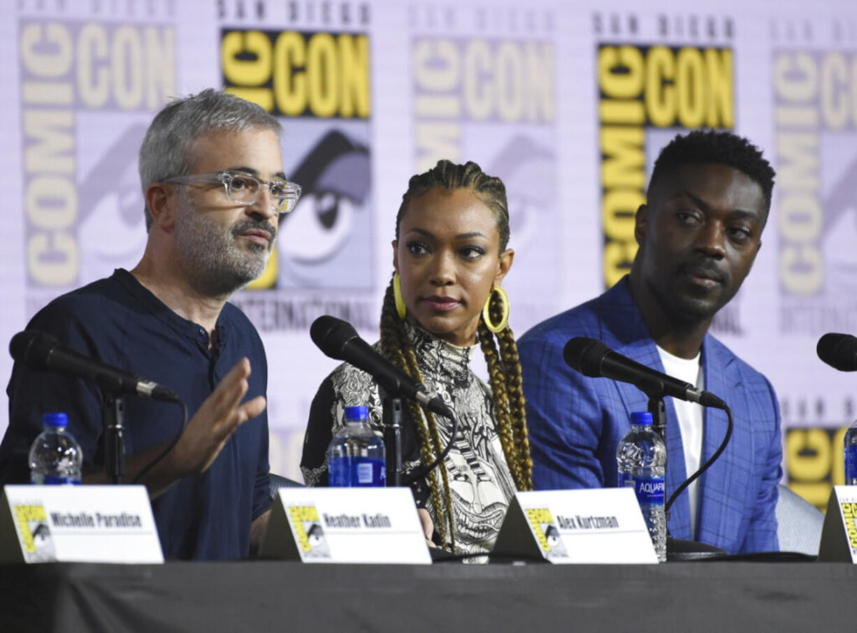 Alex Kurtzman, from left, Sonequa Martin-Green and David Ajala participate in the &ldquo;Star Trek: Discovery&rdquo; portion of the Enter the &ldquo;Star Trek&rdquo; Universe panel on day three of Comic-Con International on Saturday, July 20, 2019, in San Diego.