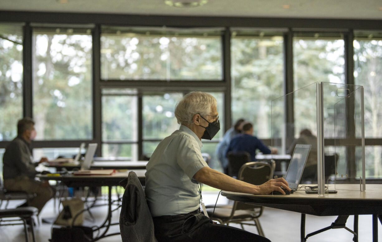 Volunteer Mark Gutman lends a hand during the AARP Tax-Aide program at the Luepke Senior Center in 2022. The Clark County Assessor&rsquo;s Office will hold events from 9 a.m. to 2:30 p.m. on May 17 at the Firstenburg Community Center in the Resource Classroom and May 31 at the Luepke Senior Center to help people apply for a state property tax exemption program for seniors and people with disabilities.