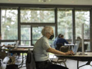 Volunteer Mark Gutman lends a hand during the AARP Tax-Aide program at the Luepke Senior Center in 2022. The Clark County Assessor&rsquo;s Office will hold events from 9 a.m. to 2:30 p.m. on May 17 at the Firstenburg Community Center in the Resource Classroom and May 31 at the Luepke Senior Center to help people apply for a state property tax exemption program for seniors and people with disabilities.