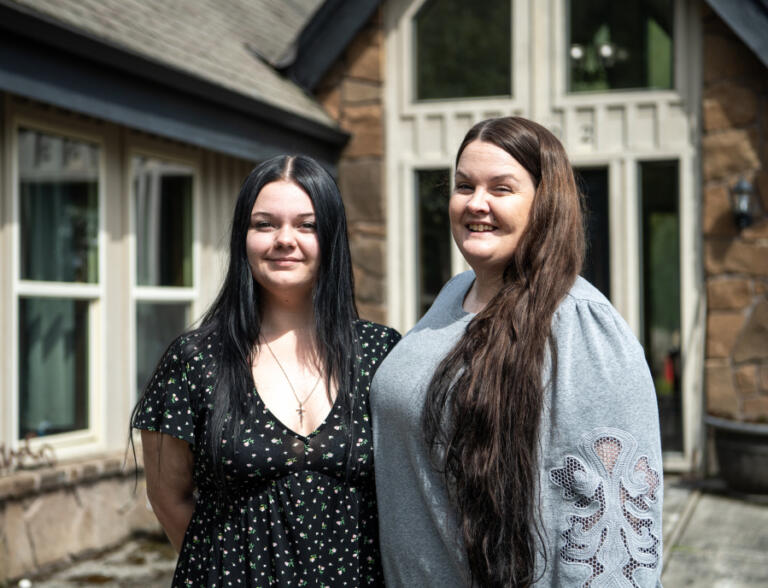 Kelly Phillips, right, stands for a portrait with her daughter, Hannah Duncan, 20. The two reunited a couple of years ago after Phillips recovered from her addiction.