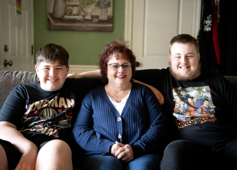 Melissa Dodge, center, sits for a portrait with her sons Lucas, 13, left, and Dylan, 18, at their home in Vancouver. Melissa Dodge co-founded the Autism Moms Support Group after she realized there weren&rsquo;t many resources for children with autism.
