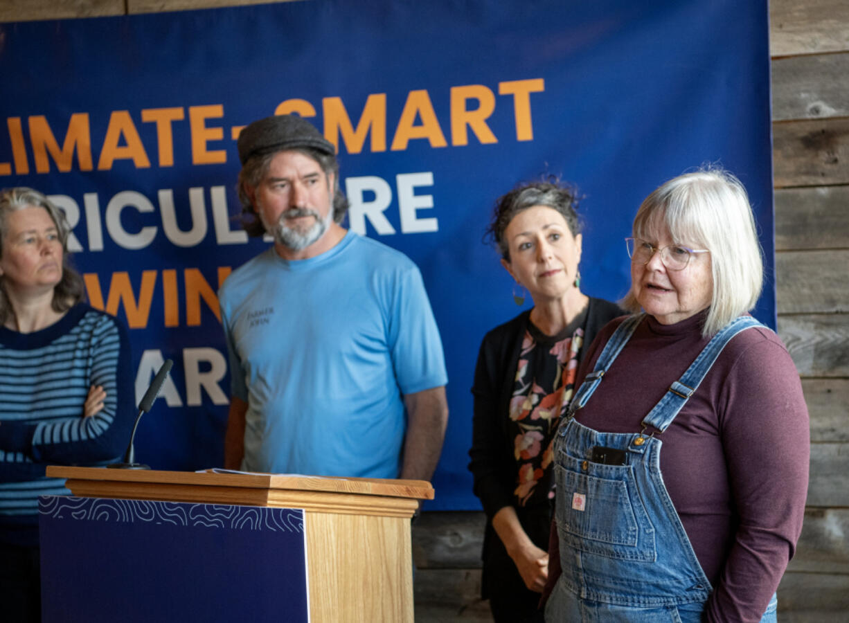 Clark County Councilor Sue Marshall, right, fields questions about farming and climate change during a Thursday news conference at Second Mile Marketplace and Food Hub in Vancouver.