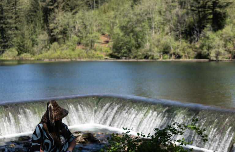 *SECONDARY* Cowlitz Indian Tribe council member Suzanne Donaldson looks out at the lake created by Kwoneesum Dam on Friday, May 10, 2024, near Washougal. The 1960s-era dam is slated to be removed, restoring the Wildboy Creek to its natural state and providing miles of fish spawning habitat.