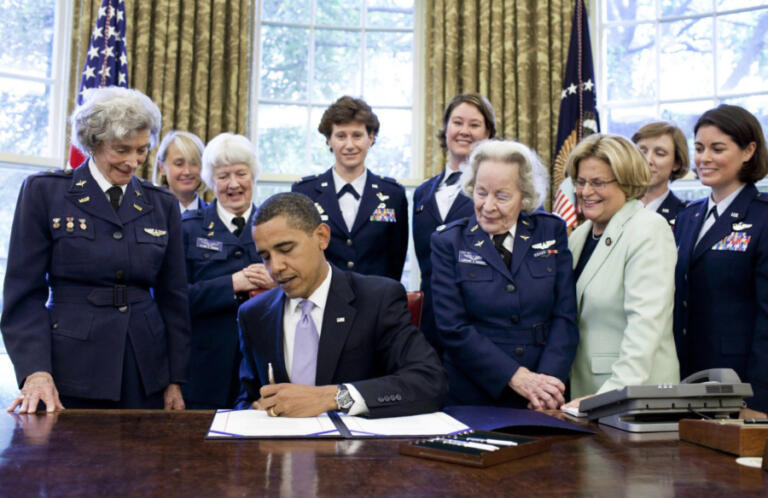 President Barack Obama signs legislation to award the Congressional Medal of Honor to Women Air Force Service Pilots (WASPs), retroactively, in 2009.