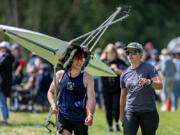 Callum Brown of the Vancouver Lake Rowing Club, left, talks with Jamie Phelps while taking part in the USRowing Northwest Youth Championships at Vancouver Lake on Friday morning.