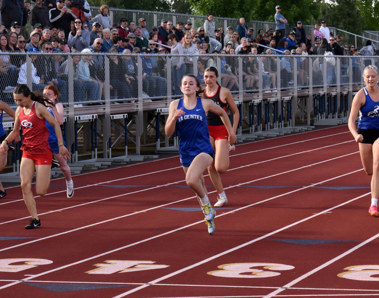 Shaela Bradley of La Center runs to victory in the girls 100 meters at the 1A District 4 track and field championships at Seton Catholic High School in Vancouver on Thursday, May 16, 2024.