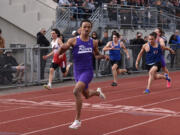 Revac Banfield of Columbia River wins the boys 100 meters at the 2A District 4 track and field championships at Tumwater High School on Friday, May 17, 2024.