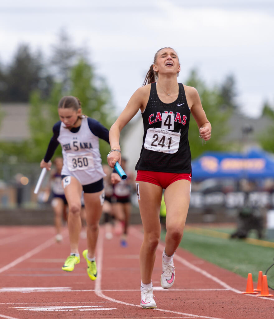 Camas’ Eliisa Marshall grimaces as she crosses the finish line in second place of the 4A Girls 4x400 relay on Saturday, May 25, at the 2A/3A/4A State Track at Mount Tahoma High School in Tacoma.