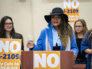Educational Opportunities for Children and Families CEO Rekah Strong, right, speaks at a press conference opposing Ballot Initiative 2109 on Wednesday at the early learning nonprofit&rsquo;s headquarters in Vancouver. I-2109 would repeal Washington&rsquo;s capital gains tax, which is expected to provide billions of dollars in support for early childhood education and schools funding over the next few years.