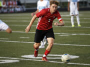 Luke Jones of Camas plays in a Class 4A boys soccer state first-round match against Mount Rainier at Doc Harris Stadium in Camas on Tuesday, May 14, 2024.