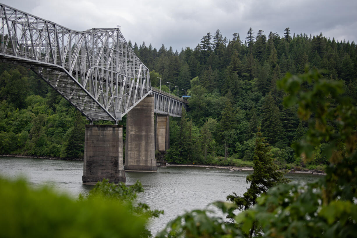 The Washington side of the Columbia River Gorge, right, appears lush from Cascade Locks with the Bridge of the Gods on Tuesday morning. Rain now doesn&rsquo;t mean we won&rsquo;t have wildfires later. &ldquo;We went from a &lsquo;normal fire season&rsquo; being 100,000 acres to the 10-year average we&rsquo;re working with right now, which is in the 400,000-acre range,&rdquo; said Kyle Thomas-Milward from the Washington Department of Natural Resources.