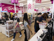 People shop at Daiso during the store's grand opening event in Downtown Summerlin in Las Vegas, Saturday, Aug. 20, 2022.