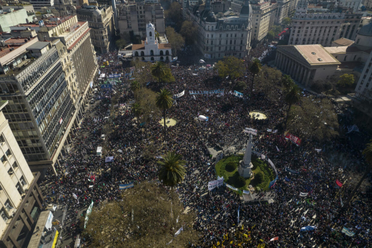 FILE - Supporters of Argentine Vice President Cristina Fernandez gather in Plaza de Mayo square the day after a person pointed a gun at her outside her home in Buenos Aires, Argentina, Friday, Sept. 2, 2022.