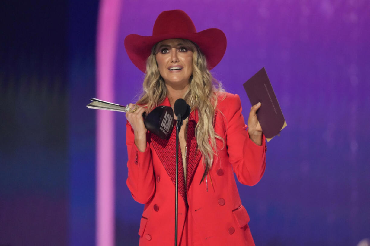 Lainey Wilson accepts the award for entertainer of the year during the 59th annual Academy of Country Music Awards on Thursday, May 16, 2024, at the Ford Center in Frisco, Texas.