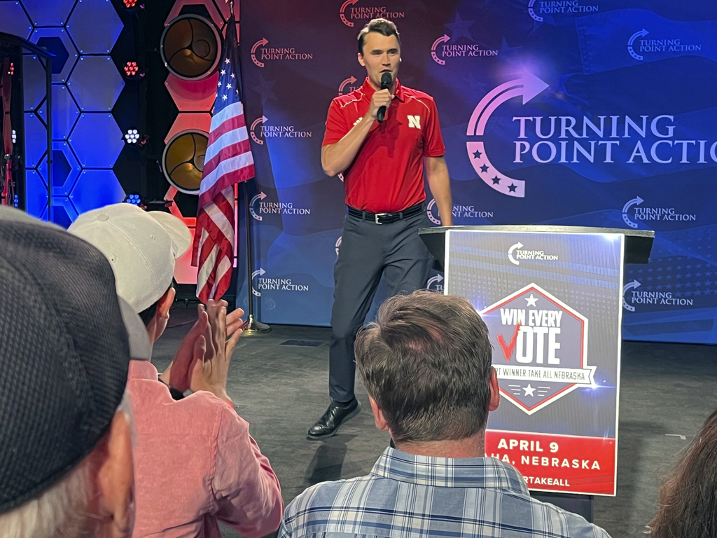 Conservative activist Charlie Kirk takes the stage before a rally held by the Nebraska Republican Party calling on Nebraska to switch to a winner-take-all method of awarding Electoral College votes ahead of this year's hotly contested presidential election, Tuesday, April 9, 2024, in Omaha, Neb. Nebraska has five presidential electoral votes, but allows the votes tied to its three congressional districts to be split based on the popular vote within each district. Maine is the only other state to split its electoral votes.