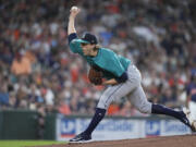 Seattle Mariners starting pitcher Logan Gilbert delivers during the first inning of a baseball game against the Houston Astro,s Saturday, May 4, 2024, in Houston. (AP Photo/Kevin M.