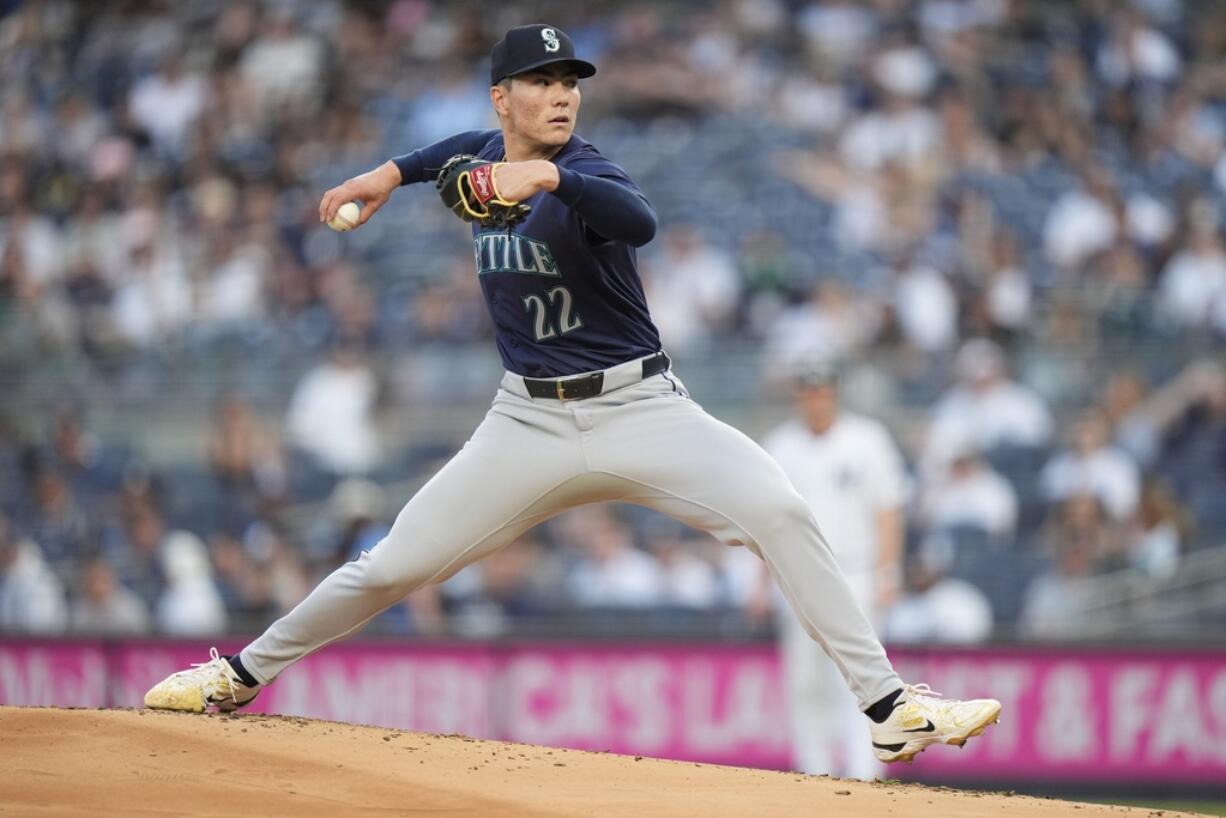 Seattle Mariners' Bryan Woo (22) pitches during the first inning of a baseball game against the New York Yankees, Tuesday, May 21, 2024, in New York.