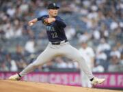 Seattle Mariners' Bryan Woo (22) pitches during the first inning of a baseball game against the New York Yankees, Tuesday, May 21, 2024, in New York.