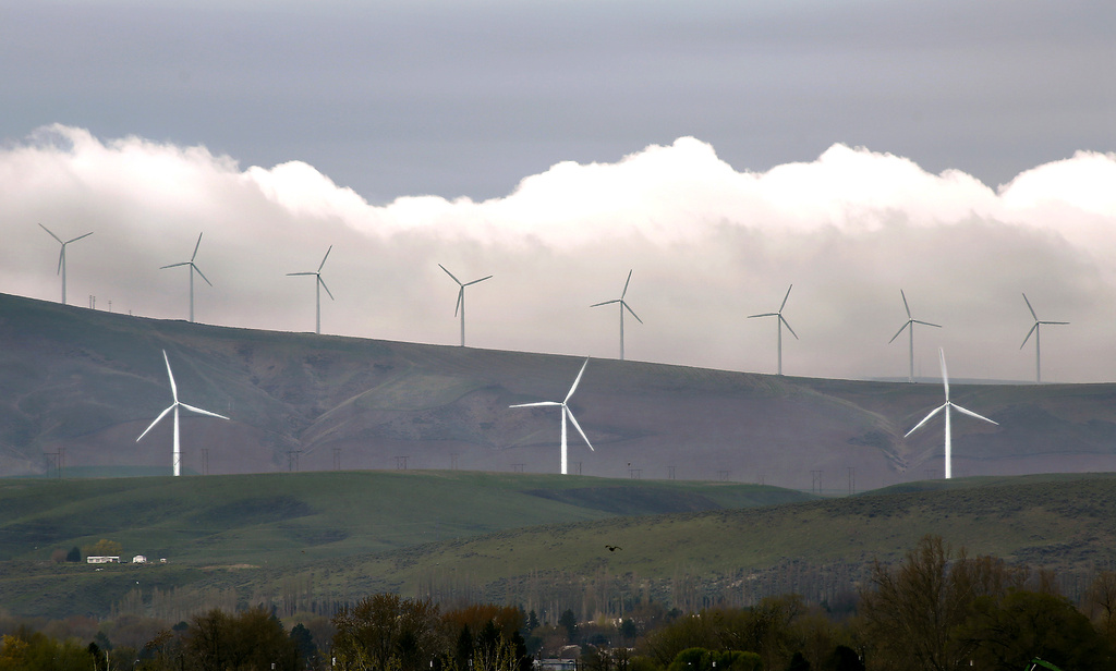 FILE - Wind turbines are seen on April 16, 2019, south of Kennewick, Wash. Washington Gov. Jay Inslee on Thursday, May 23, 2024, rejected a recommendation to cut a proposal for what would be the state's largest wind farm in half, giving new life to the $1.7 billion project.
