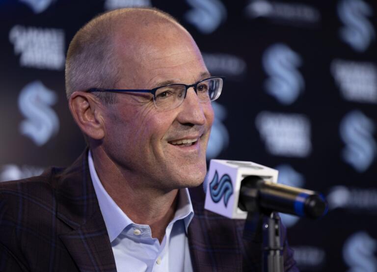 New Seattle Kraken NHL hockey team head coach Dan Bylsma smiles during an introductory press conference in Seattle, Tuesday, May 28, 2024.
