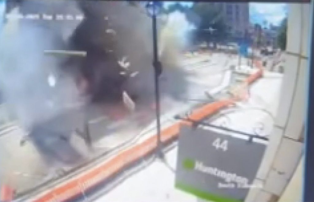 This image made from video provided by Cleveland 19 WOIO-TV shows debris flying through the air after a natural gas explosion caused extensive damage to a building in Youngstown, Ohio, Tuesday, May 28, 2024, and injured people, authorities said.