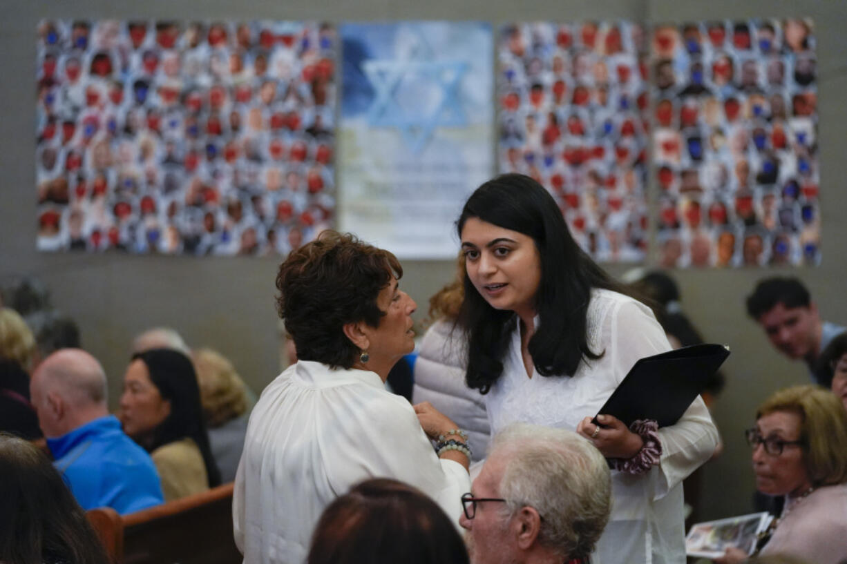 Writer Lulu Fairman, left, talks with writer and co-producer Maryam Chishti before a performance May 22 of &ldquo;What Do I Do With All This Heritage?&rdquo; in Los Angeles.