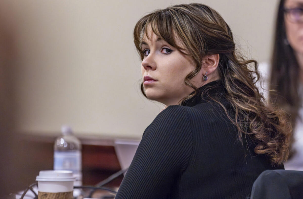 FILE - Hannah Gutierrez-Reed, the former armorer at the movie &quot;Rust,&quot; listens to closing arguments in her trial at district court, Wednesday, March 6, 2024, in Santa Fe, N.M. The movie weapons armorer is appealing her conviction for involuntary manslaughter in the fatal shooting of a cinematographer by Alec Baldwin on the set of the Western film &ldquo;Rust.&rdquo; In court documents released Tuesday, May 14, 2024 a defense attorney for Gutierrez-Reed filed a notice of appeal of the March conviction by a jury.