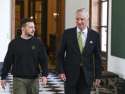 Belgium&rsquo;s King Philippe, right, walks with Ukraine&rsquo;s President Volodymyr Zelenskyy prior to a meeting at the Royal Palace in Brussels, Tuesday, May 28, 2024. President Volodymyr Zelenskyy on Tuesday will get a look at F-16 jets Belgium will send to Ukraine as of later this year and receive more security commitments while European Union defense ministers will again seek to overcome Hungarian objections to send billions of euros in military aid to Kyiv.