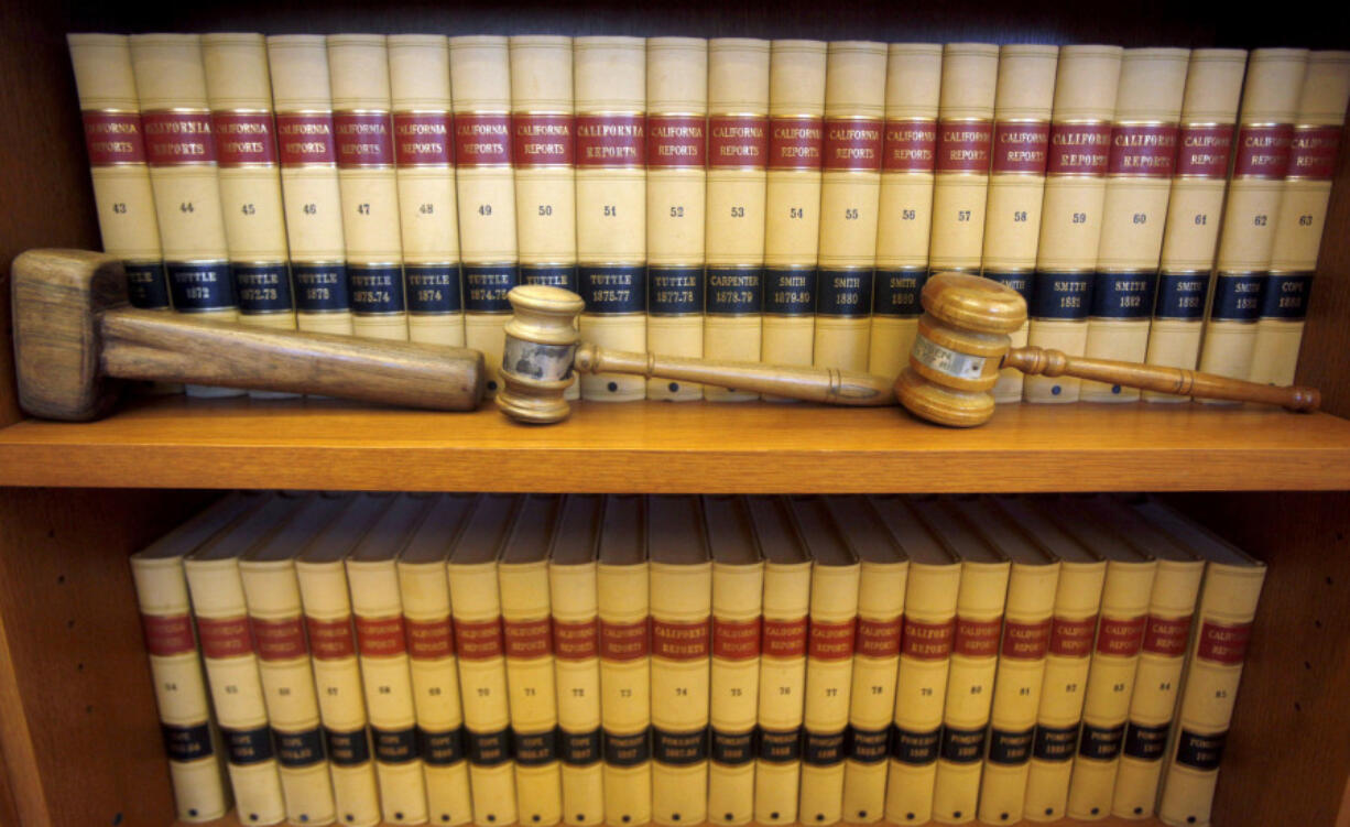 FILE-- Gavels and law books are shown, July 14, 2010 in San Francisco, Calif. The Senate is set to confirm the 200th federal judge of President Joe Biden&rsquo;s tenure. That&#039;s about a month before then-President Donald Trump hit the 200 threshold. Trump still holds the edge when it comes to the most impactful confirmations &mdash; those to the U.S. Supreme Court and the country&rsquo;s 13 appellate courts.