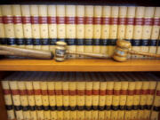 FILE-- Gavels and law books are shown, July 14, 2010 in San Francisco, Calif. The Senate is set to confirm the 200th federal judge of President Joe Biden&rsquo;s tenure. That&#039;s about a month before then-President Donald Trump hit the 200 threshold. Trump still holds the edge when it comes to the most impactful confirmations &mdash; those to the U.S. Supreme Court and the country&rsquo;s 13 appellate courts.