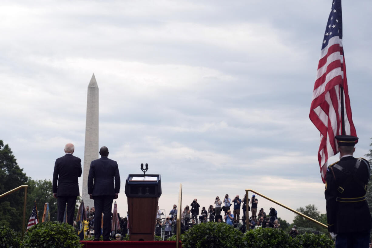 President Joe Biden and Kenya&rsquo;s President William Ruto participate in a State Arrival Ceremony on the South Lawn of the White House, Thursday, May 23, 2024, in Washington, with the Washington Monument in the background.