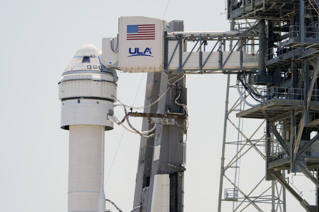 FILE - Boeing&#039;s Starliner capsule atop an Atlas V rocket is seen at Space Launch Complex 41 at the Cape Canaveral Space Force Station a day after its mission to the International Space Station was scrubbed because of an issue with a pressure regulation valve, Tuesday, May 7, 2024, in Cape Canaveral, Fla. Boeing is now aiming for its first astronaut launch at the beginning of June.