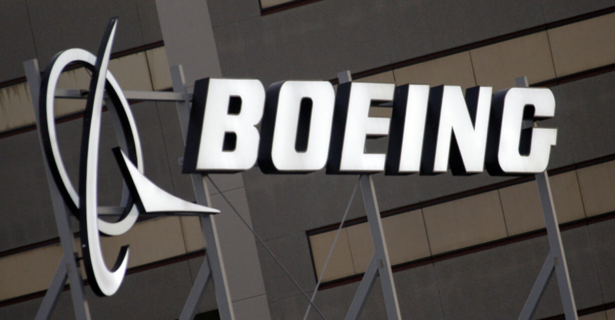 FILE - The Boeing logo is seen, Jan. 25, 2011, on the property in El Segundo, Calif. Boeing is threatening to lock out its private force of firefighters who protect its aircraft-manufacturing plants in the Seattle area Friday night, May 3, 2024, unless the workers accept the company&#039;s last offer on wages.