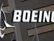 FILE - The Boeing logo is seen, Jan. 25, 2011, on the property in El Segundo, Calif. Boeing is threatening to lock out its private force of firefighters who protect its aircraft-manufacturing plants in the Seattle area Friday night, May 3, 2024, unless the workers accept the company&#039;s last offer on wages.