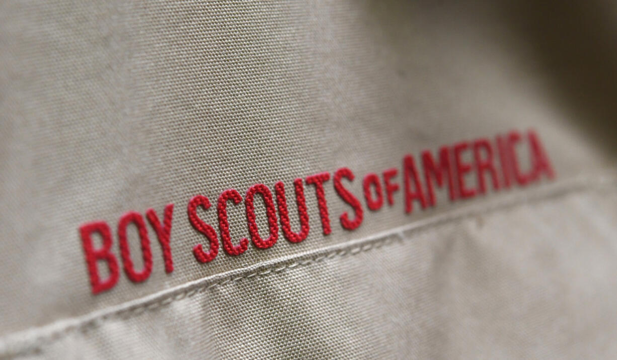 FILE - A Boy Scout uniform is displayed, Feb. 18, 2020, in the retail store at the headquarters for the French Creek Council of the Boy Scouts of America in Summit Township, Erie County, Pa. The U.S. organization, which now welcomes girls into the program and allows them to work toward the coveted Eagle Scout rank, announced Tuesday, May 7, 2024, that it will change its name to Scouting America as it focuses on inclusion.