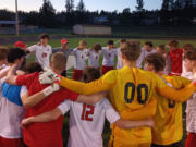 The Camas boys soccer team gathers on the field after beating Union 3-2 in 4A bi-district playoff match at Fishback Stadium in Washougal on Thursday, May 8, 2024.